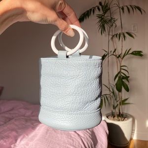 simon miller bonsai bag in sweet pale blue w white handles